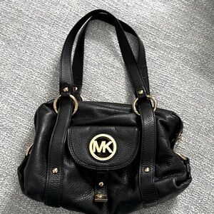 MICHAEL KORS Black leather double handled bag with gold toned hardware good cond